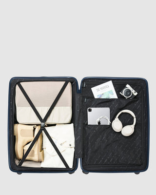 Rolling vs Packing Clothes in Luggage - Globite