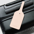 Leather Luggage Tag Brush Pink on Suitcase