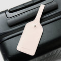 Pink Rose Leather Luggage Tag on Suitcase